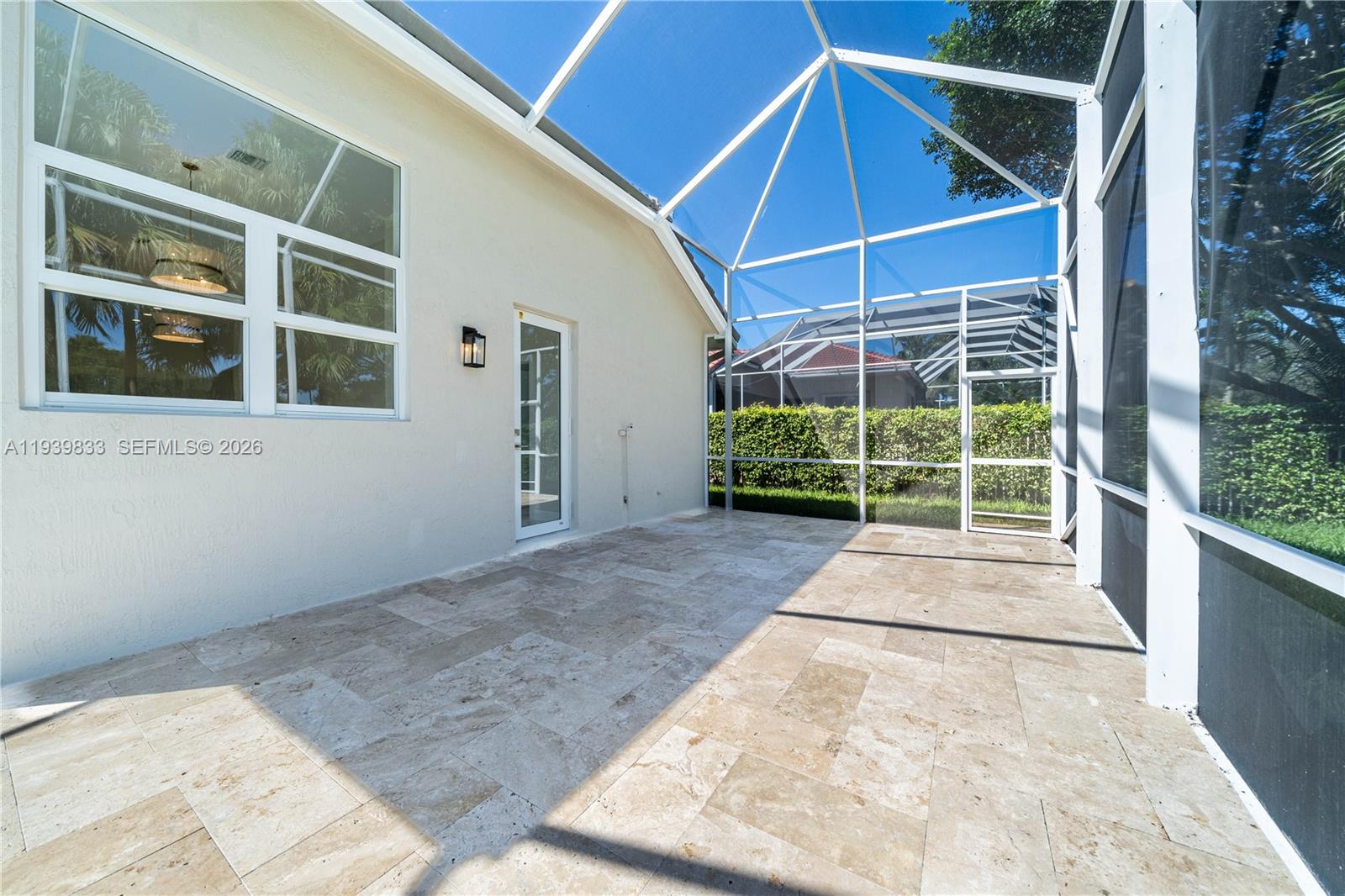 8041 Bermuda Point Lane Davie, FL 33328 - Photo 53 of 60 a view of a house with a large window