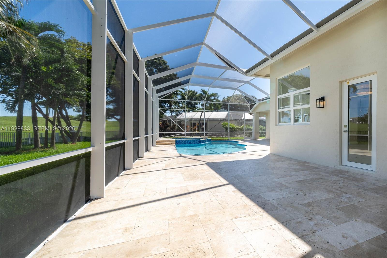 8041 Bermuda Point Lane Davie, FL 33328 - Photo 54 of 60 a view of a house with backyard and porch