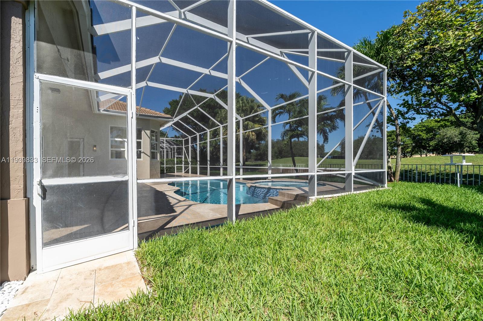 8041 Bermuda Point Lane Davie, FL 33328 - Photo 55 of 60 a view of house with backyard