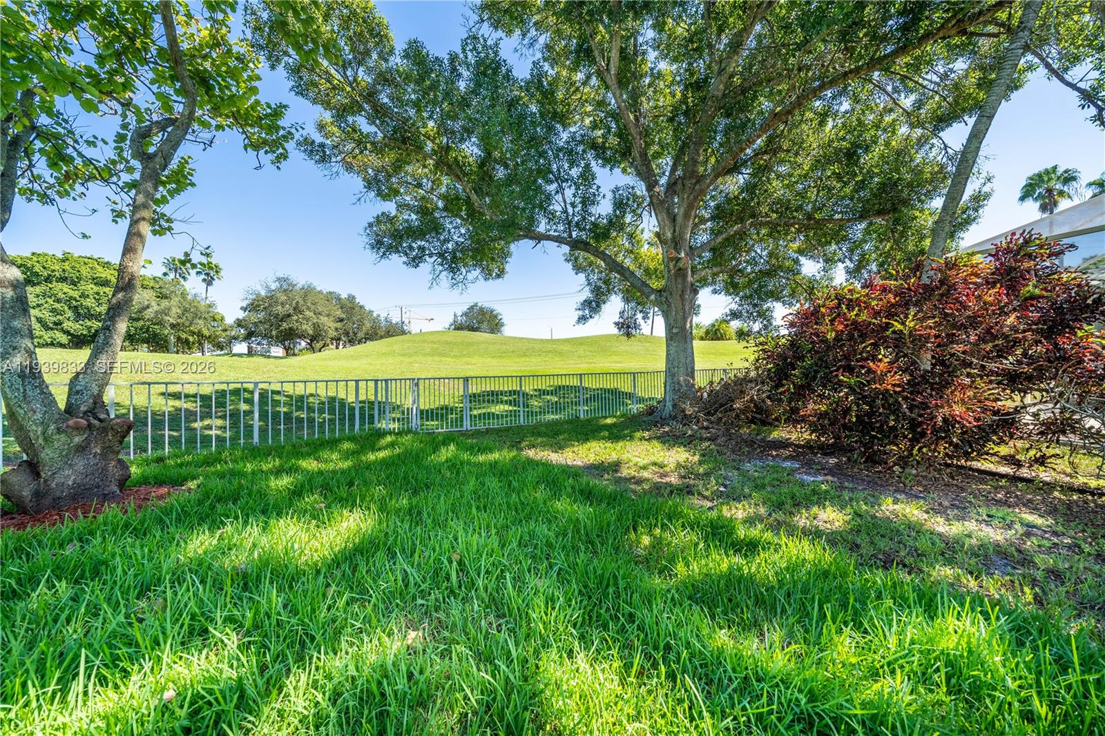 8041 Bermuda Point Lane Davie, FL 33328 - Photo 56 of 60 a view of a house with a big yard