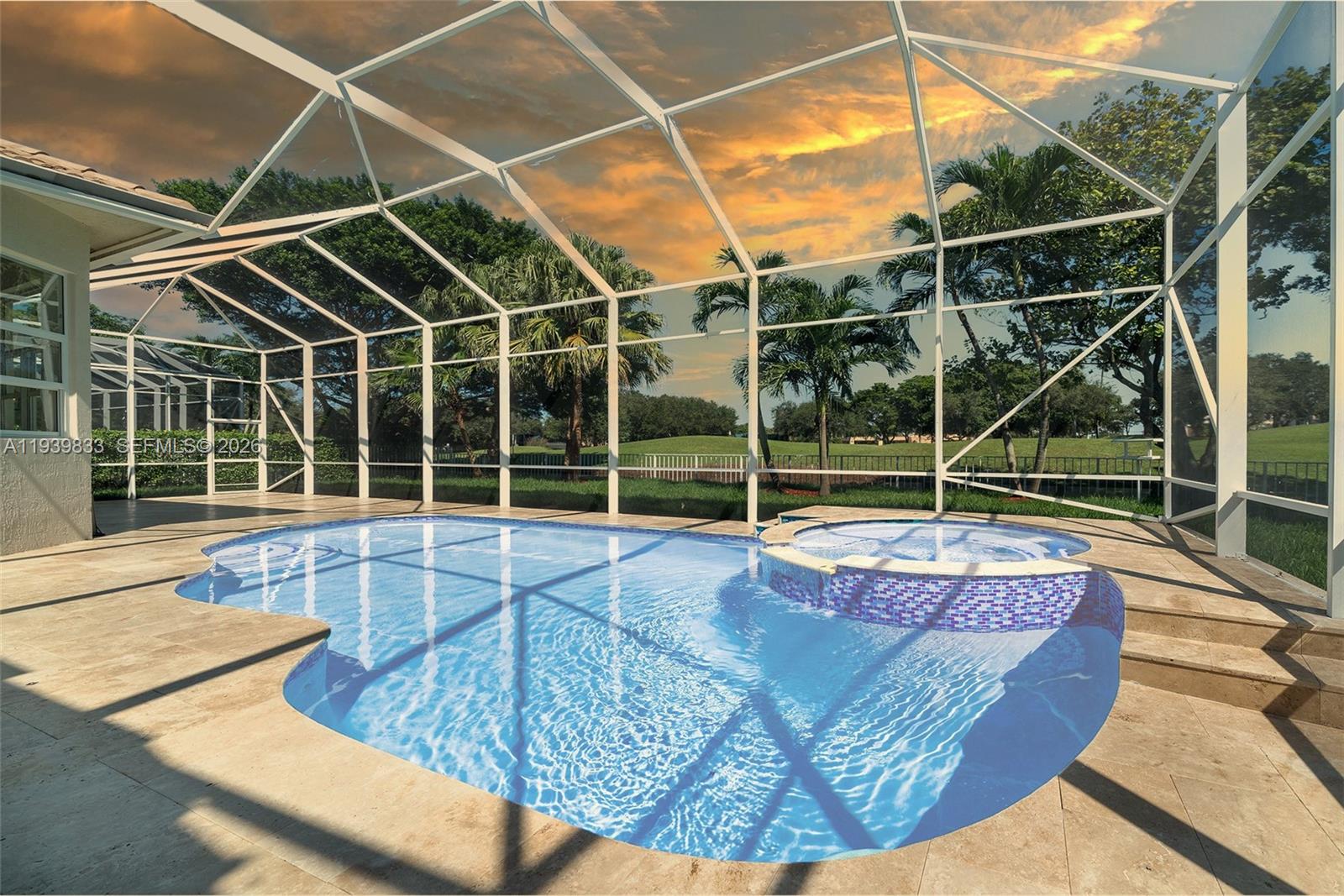 8041 Bermuda Point Lane Davie, FL 33328 - Photo 59 of 60 a view of a swimming pool with potted plants