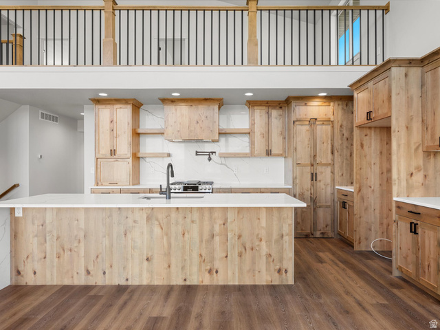 1159 North Broad Hollow Road Garden City, UT 84028 - Photo 28 of 55 Gourmet kitchen with natural wood cabinetry and a large central island