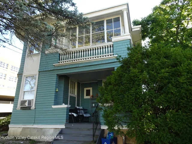 a view of a house with a balcony