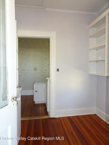 a kitchen that has a sink and large window