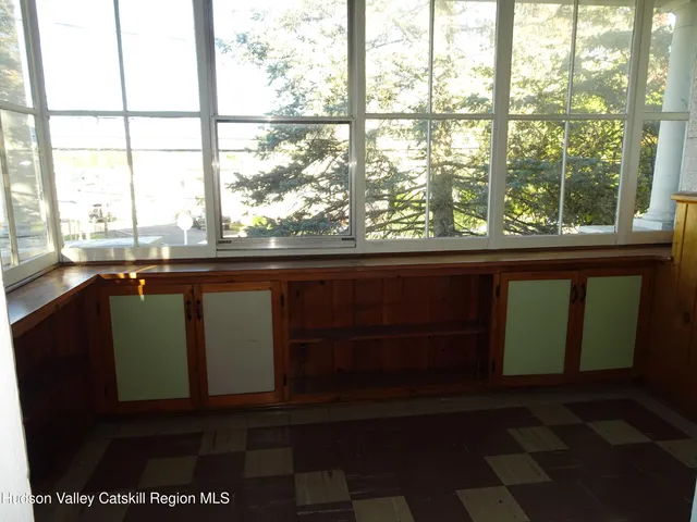 a balcony with view of the ocean