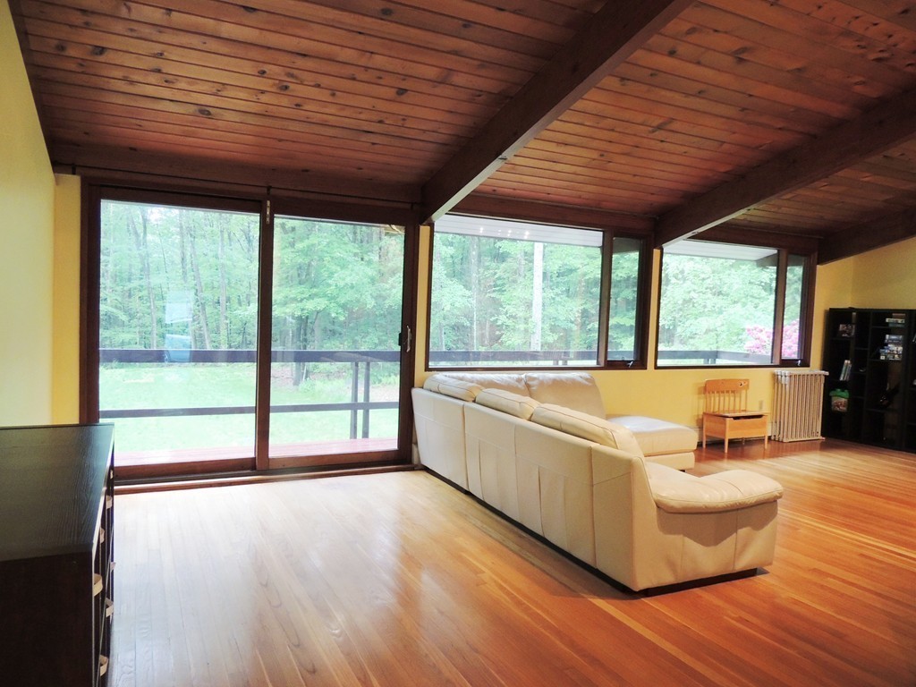 76 Wolf Rock Road Carlisle, MA 01741 - Photo 5 of 20 a living room with furniture and wooden floors