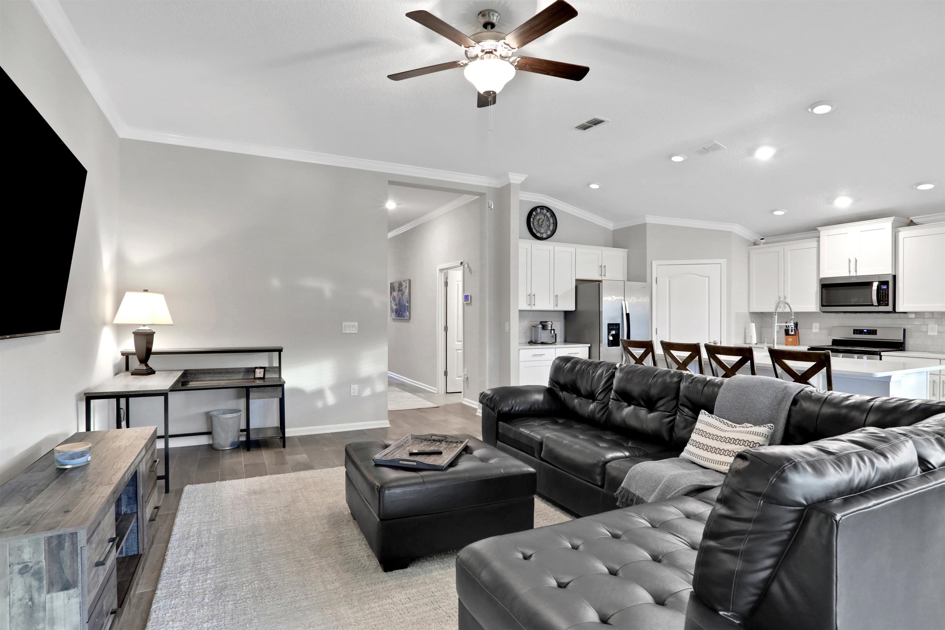 Undisclosed Address St. Augustine, FL 32095 - Photo 19 of 51 a living room with furniture and a flat screen tv