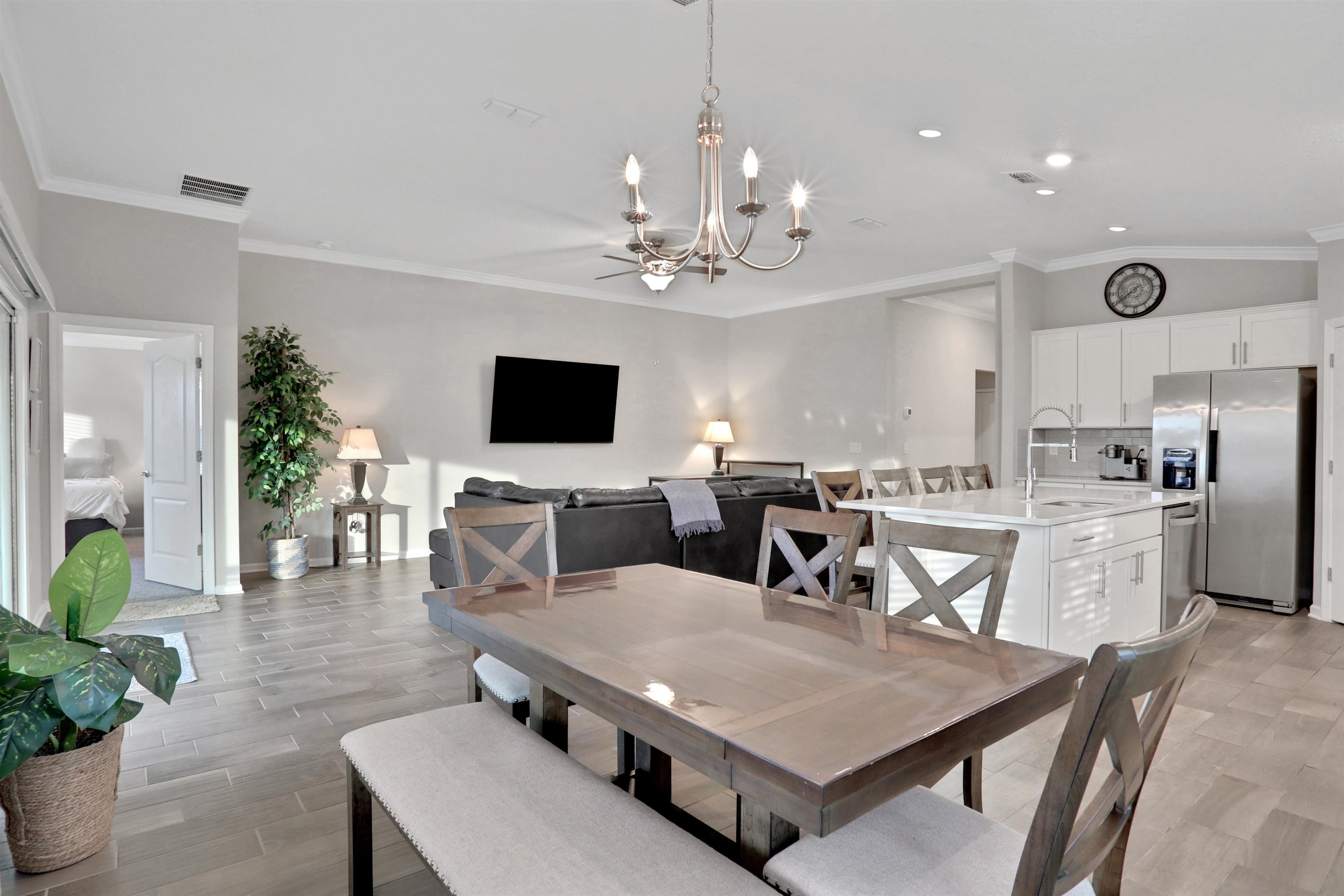 Undisclosed Address St. Augustine, FL 32095 - Photo 24 of 51 a living room with stainless steel appliances furniture a rug and a kitchen view