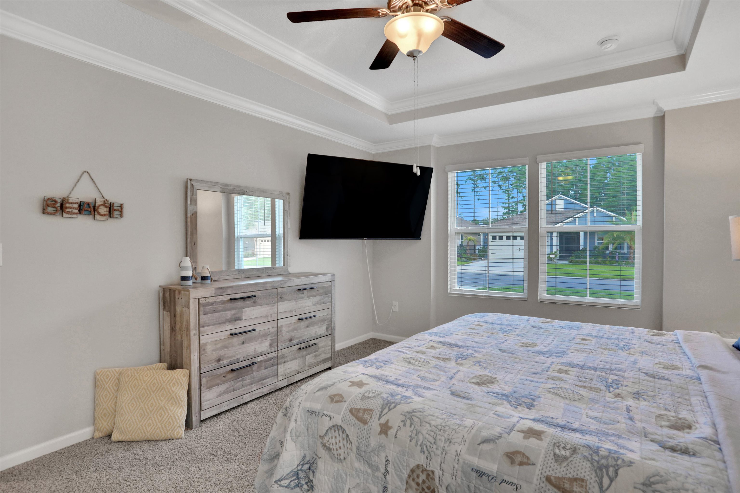 Undisclosed Address St. Augustine, FL 32095 - Photo 3 of 51 a bedroom with furniture and a flat screen tv