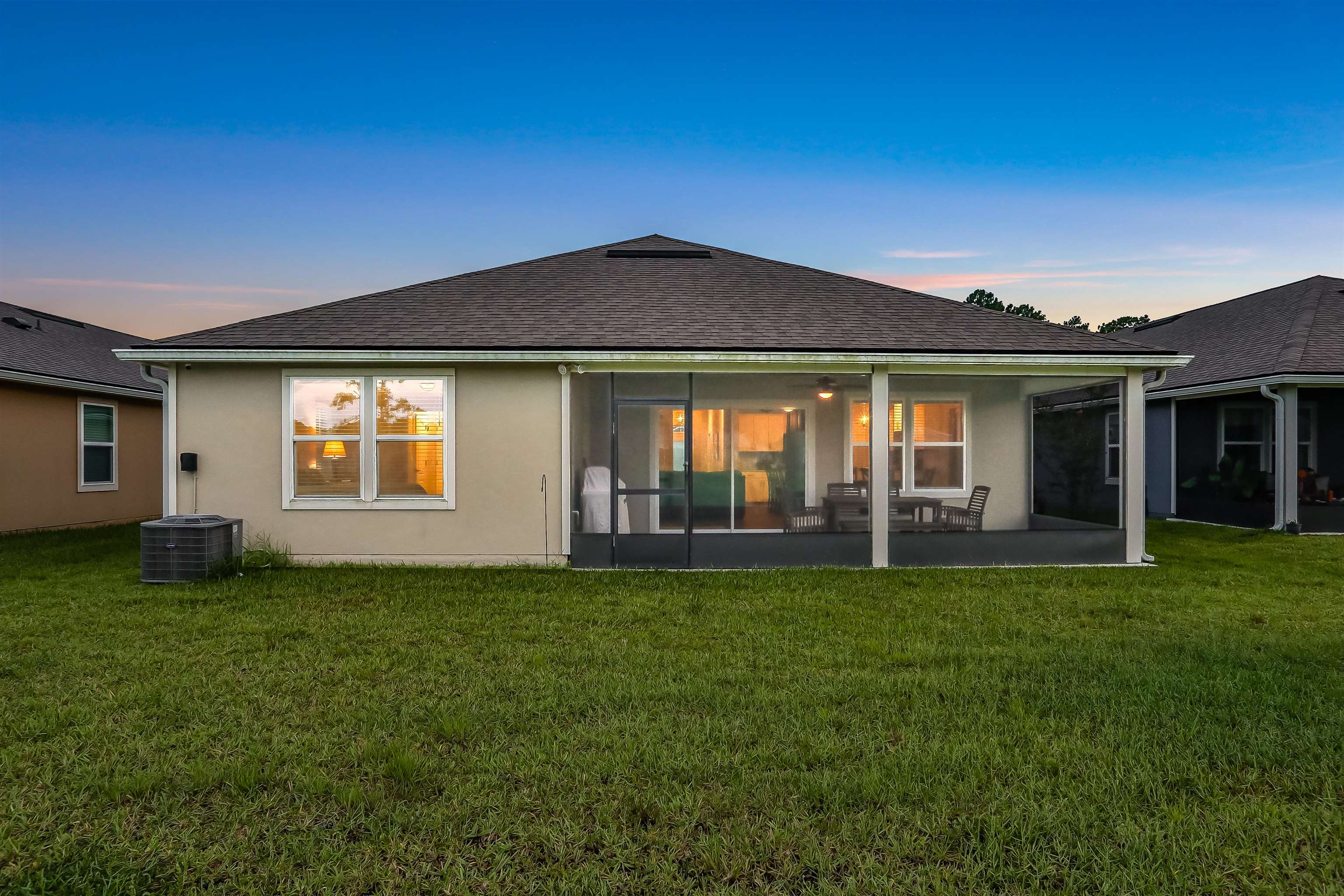 Undisclosed Address St. Augustine, FL 32095 - Photo 35 of 51 a front view of a house with a garden