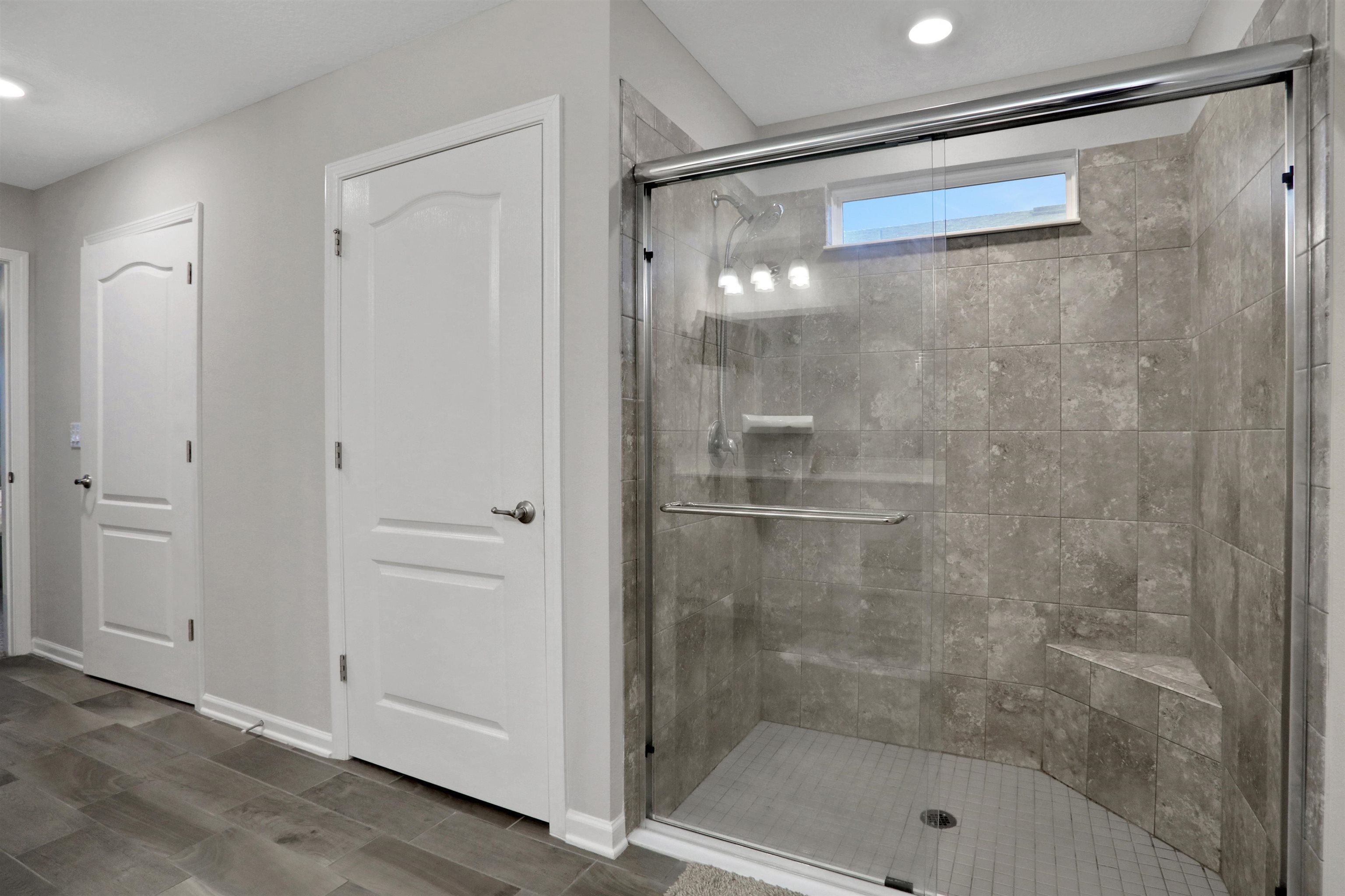 Undisclosed Address St. Augustine, FL 32095 - Photo 35 of 51 a bathroom with a glass shower door