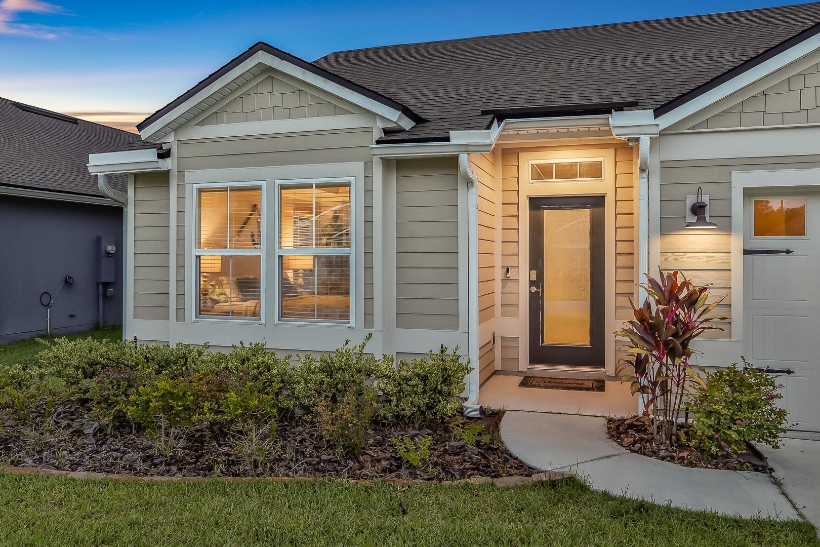 Undisclosed Address St. Augustine, FL 32095 - Photo 37 of 51 a front view of a house with garden