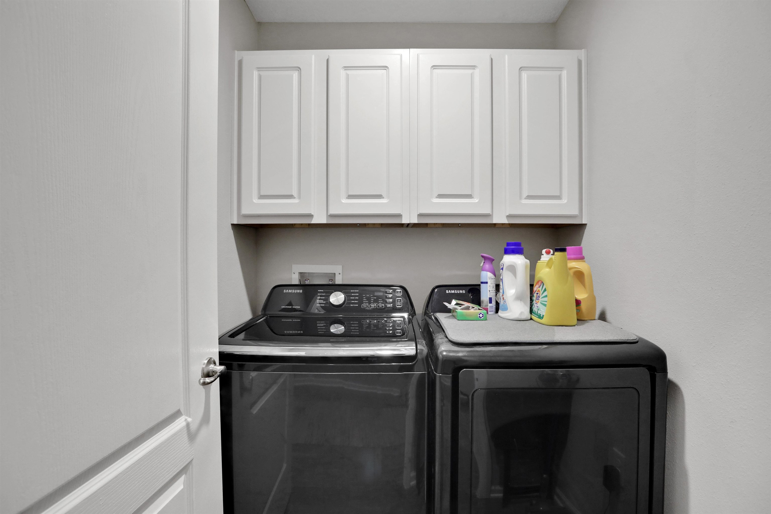 Undisclosed Address St. Augustine, FL 32095 - Photo 49 of 51 a kitchen with granite countertop a sink stove and cabinets