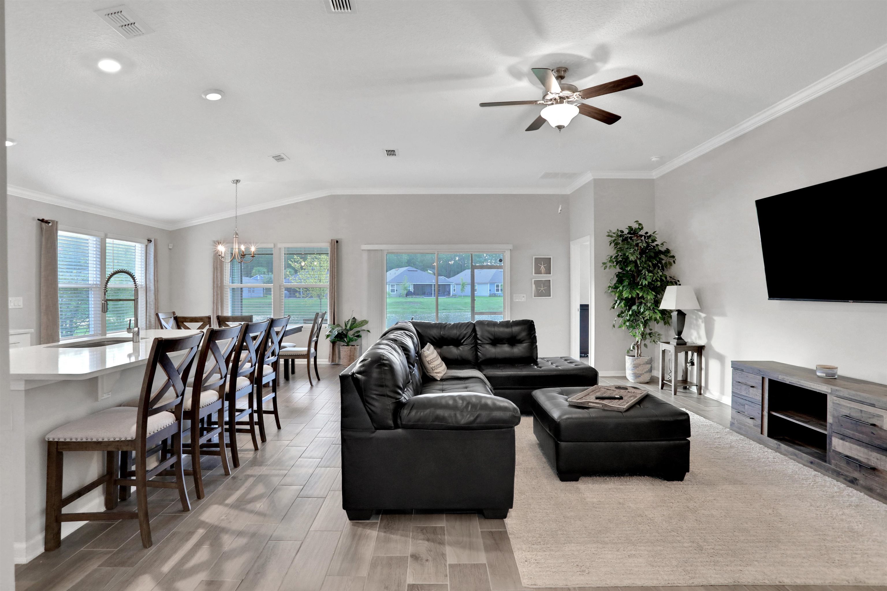 Undisclosed Address St. Augustine, FL 32095 - Photo 50 of 51 a living room with furniture fireplace and a flat screen tv