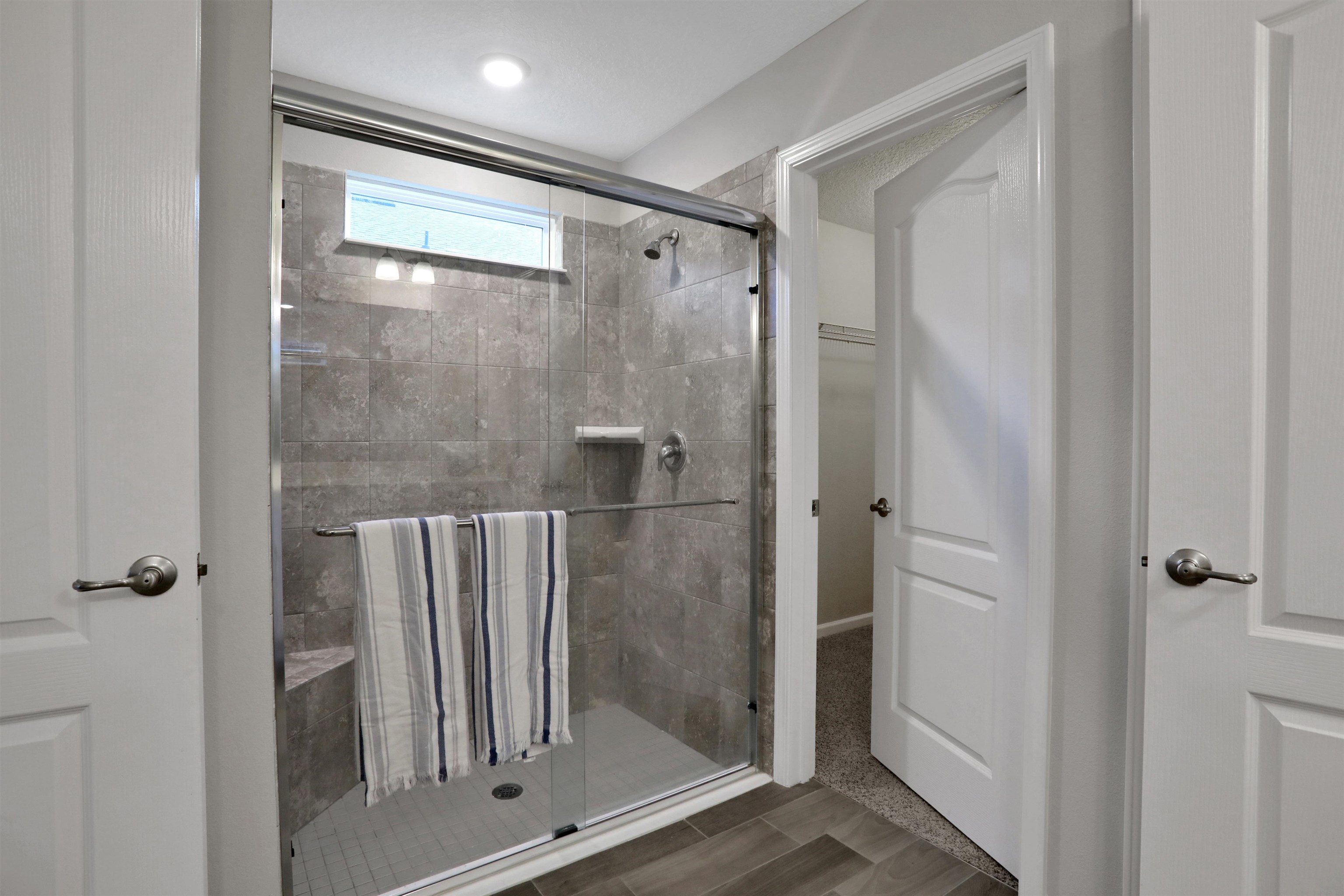 Undisclosed Address St. Augustine, FL 32095 - Photo 6 of 51 a bathroom with a glass shower door