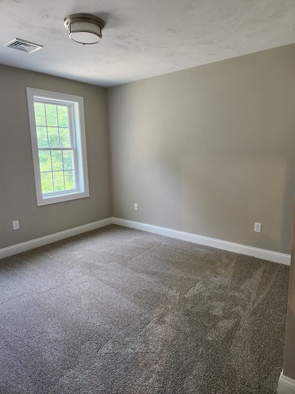 81 Purgatory Road Sutton, MA 01590 - Photo 25 of 35 an empty room with a window