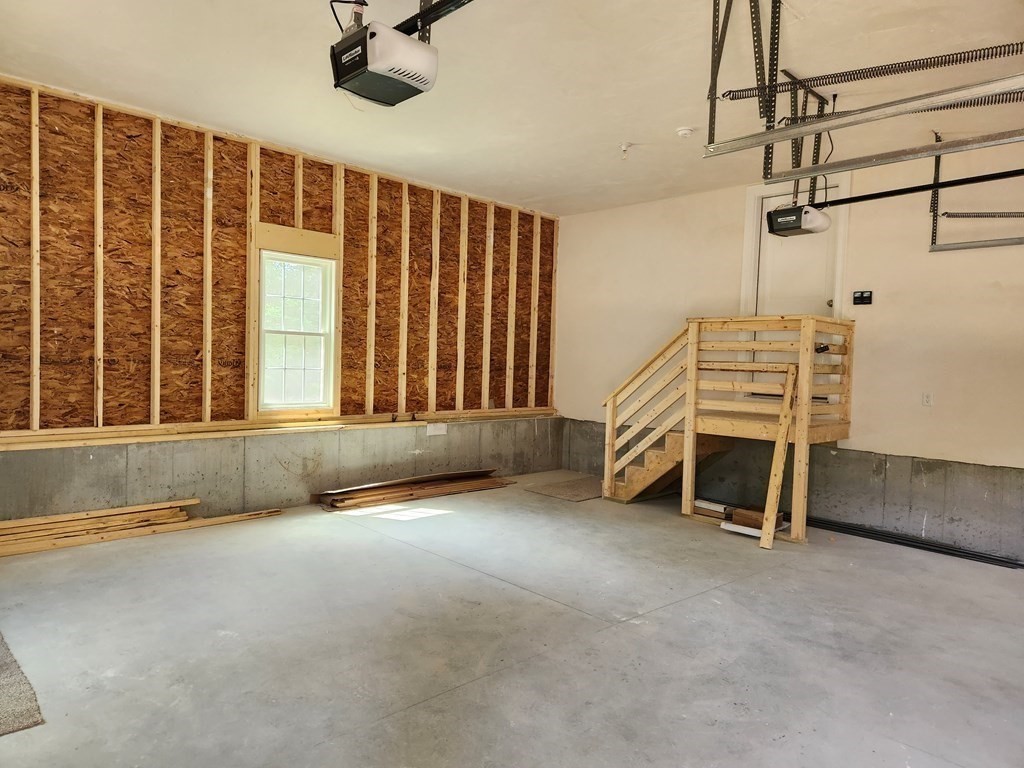 81 Purgatory Road Sutton, MA 01590 - Photo 29 of 35 a view of a room with stairs and windows
