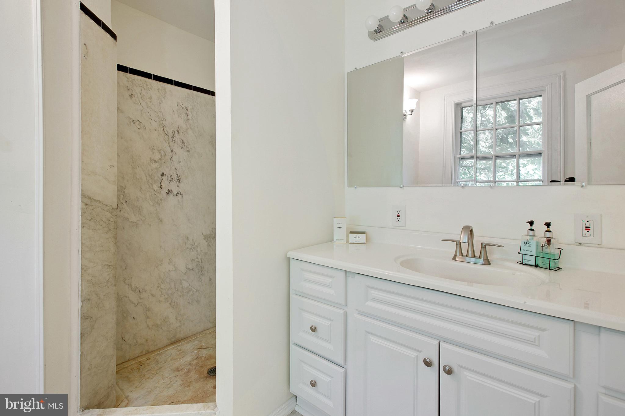 511 Woodside Road Baltimore, MD 21229 - Photo 33 of 57 Master bathroom with walk in shower