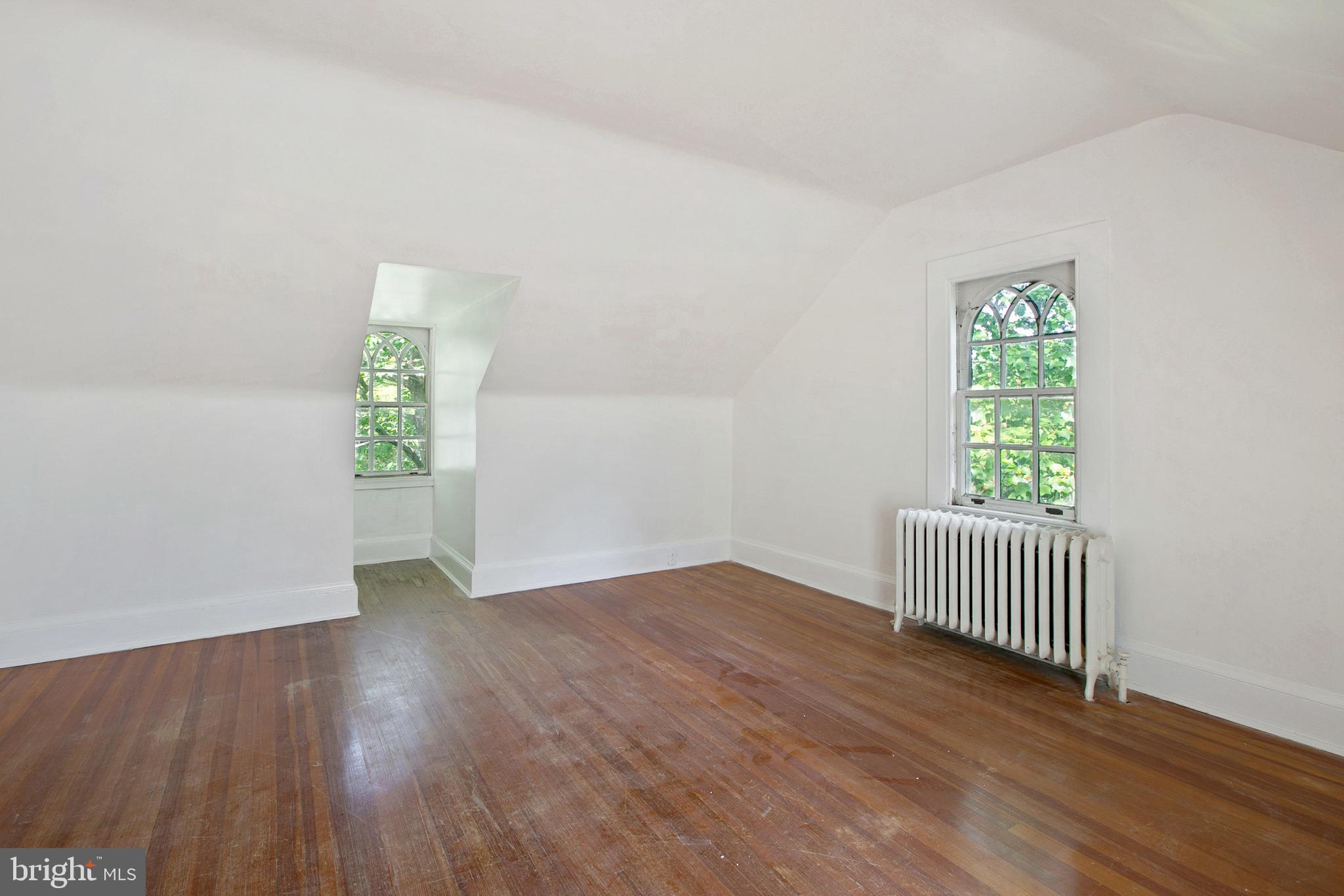 511 Woodside Road Baltimore, MD 21229 - Photo 41 of 57 5th bedroom with original wood floors