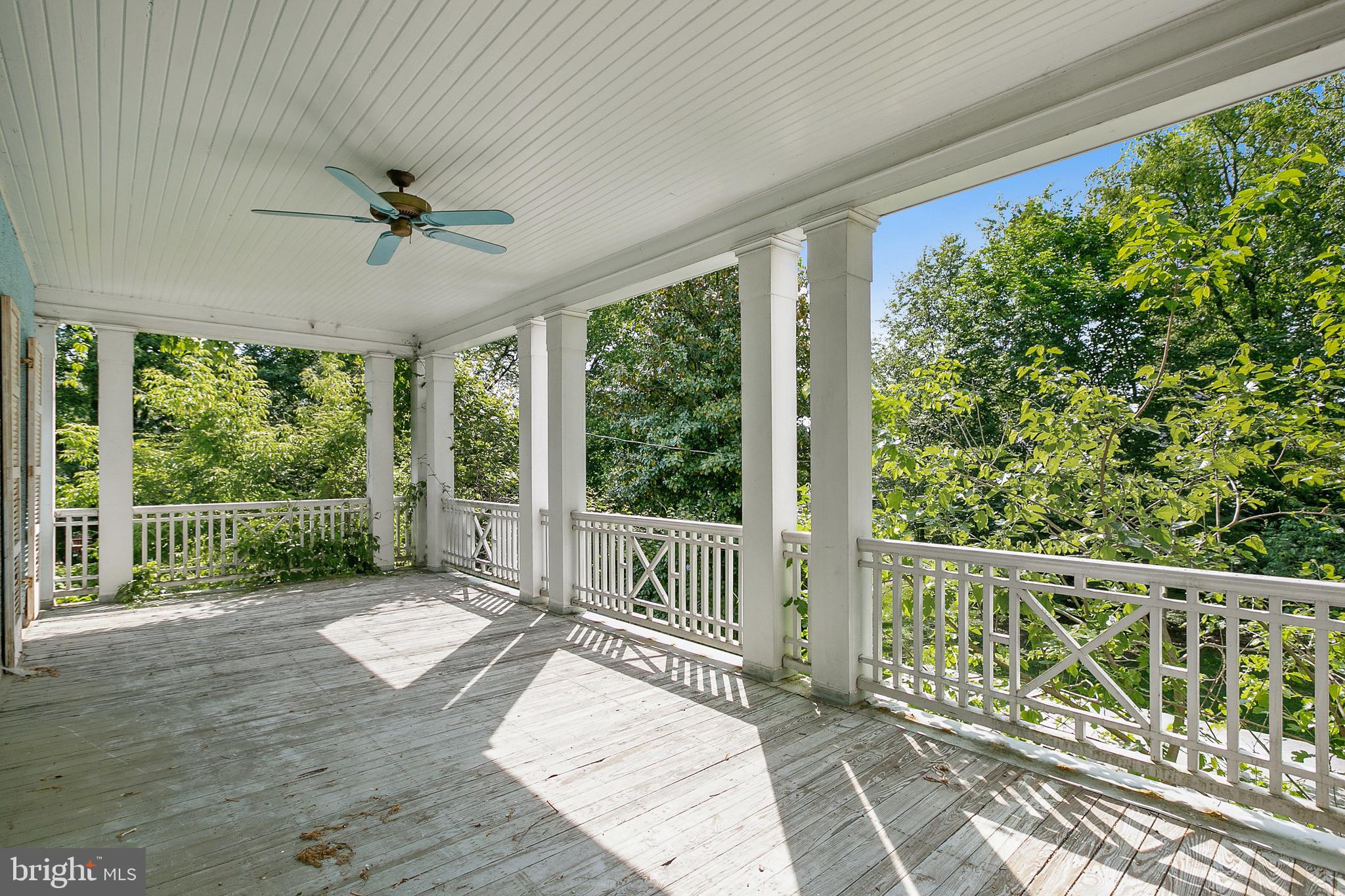 511 Woodside Road Baltimore, MD 21229 - Photo 46 of 57 Access to covered porch from 2 2nd level bedrooms