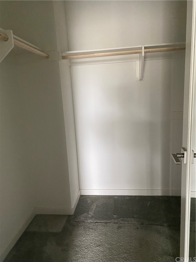163 Stage Irvine, CA 92618 - Photo 12 of 18 a view of an empty walk in closet