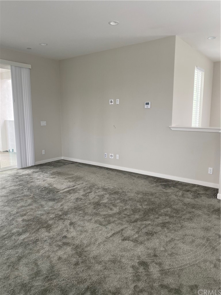 163 Stage Irvine, CA 92618 - Photo 14 of 18 an empty room with a natural light