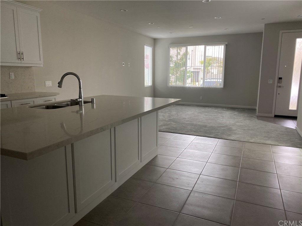 163 Stage Irvine, CA 92618 - Photo 7 of 18 a view of a kitchen with a sink and cabinets