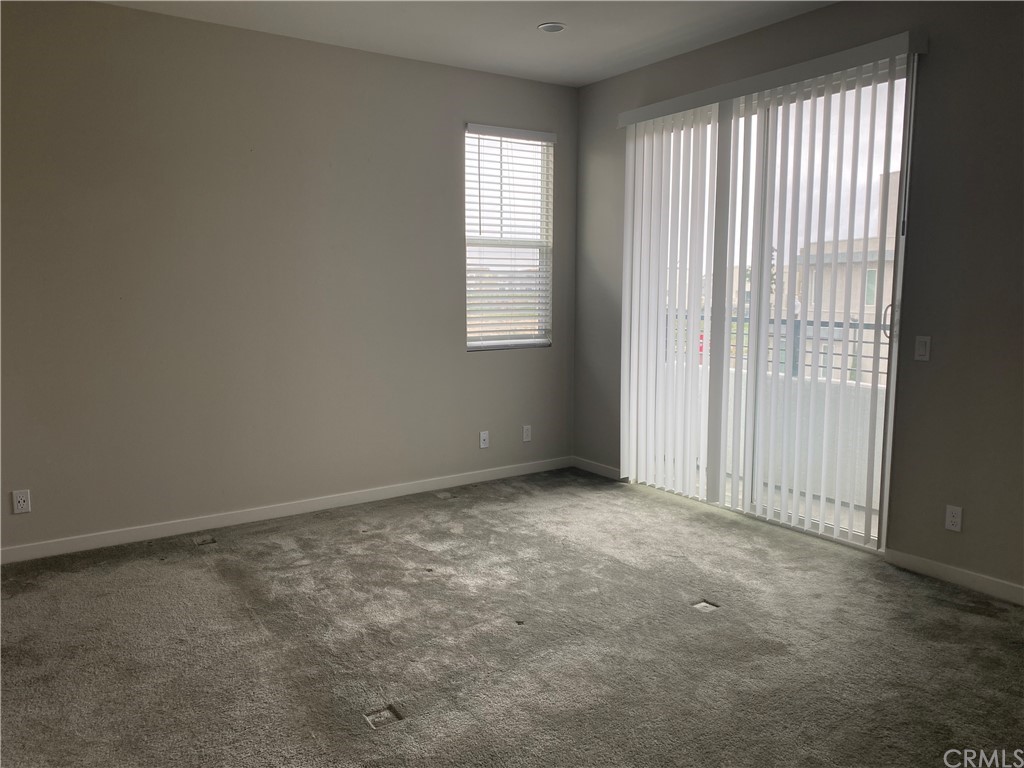 163 Stage Irvine, CA 92618 - Photo 9 of 18 an empty room with windows