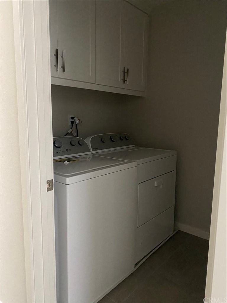 163 Stage Irvine, CA 92618 - Photo 10 of 18 a utility room with dryer and washer