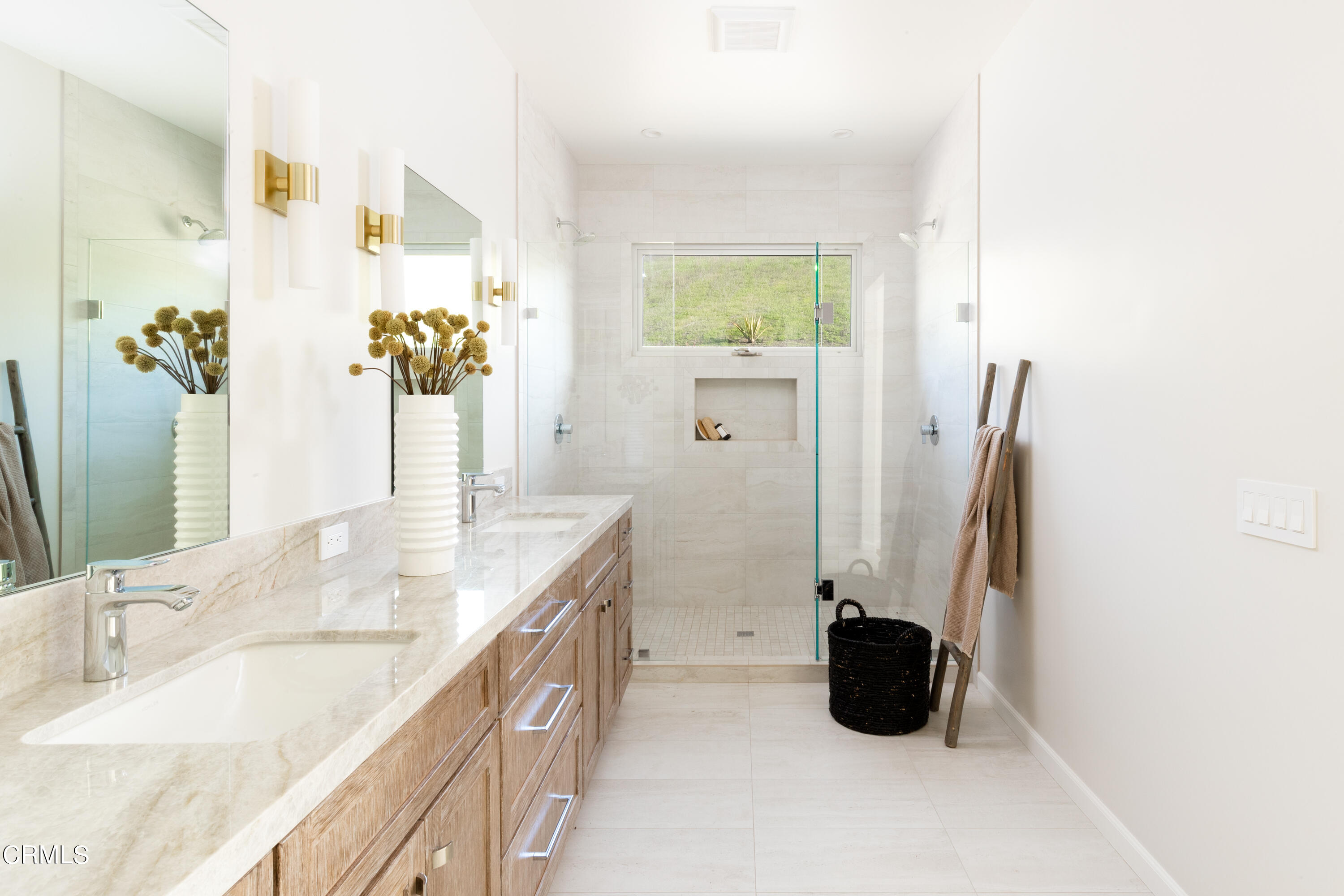 119 Hollister Ranch Road Goleta, CA 93117 - Photo 11 of 40 a bathroom with a double sink and a mirror