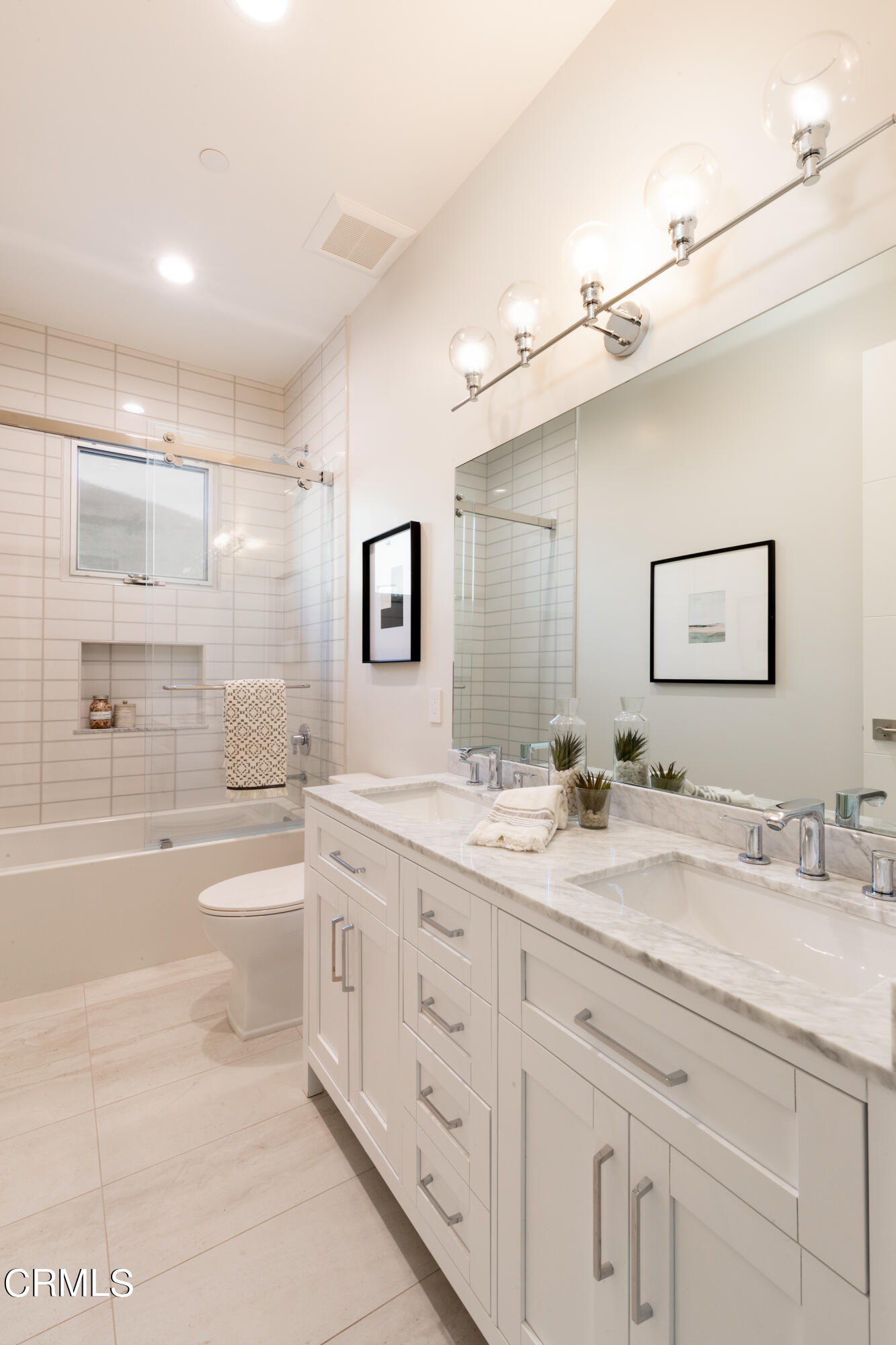 119 Hollister Ranch Road Goleta, CA 93117 - Photo 13 of 40 a bathroom with a granite countertop sink mirror double vanity shower and a bathtub
