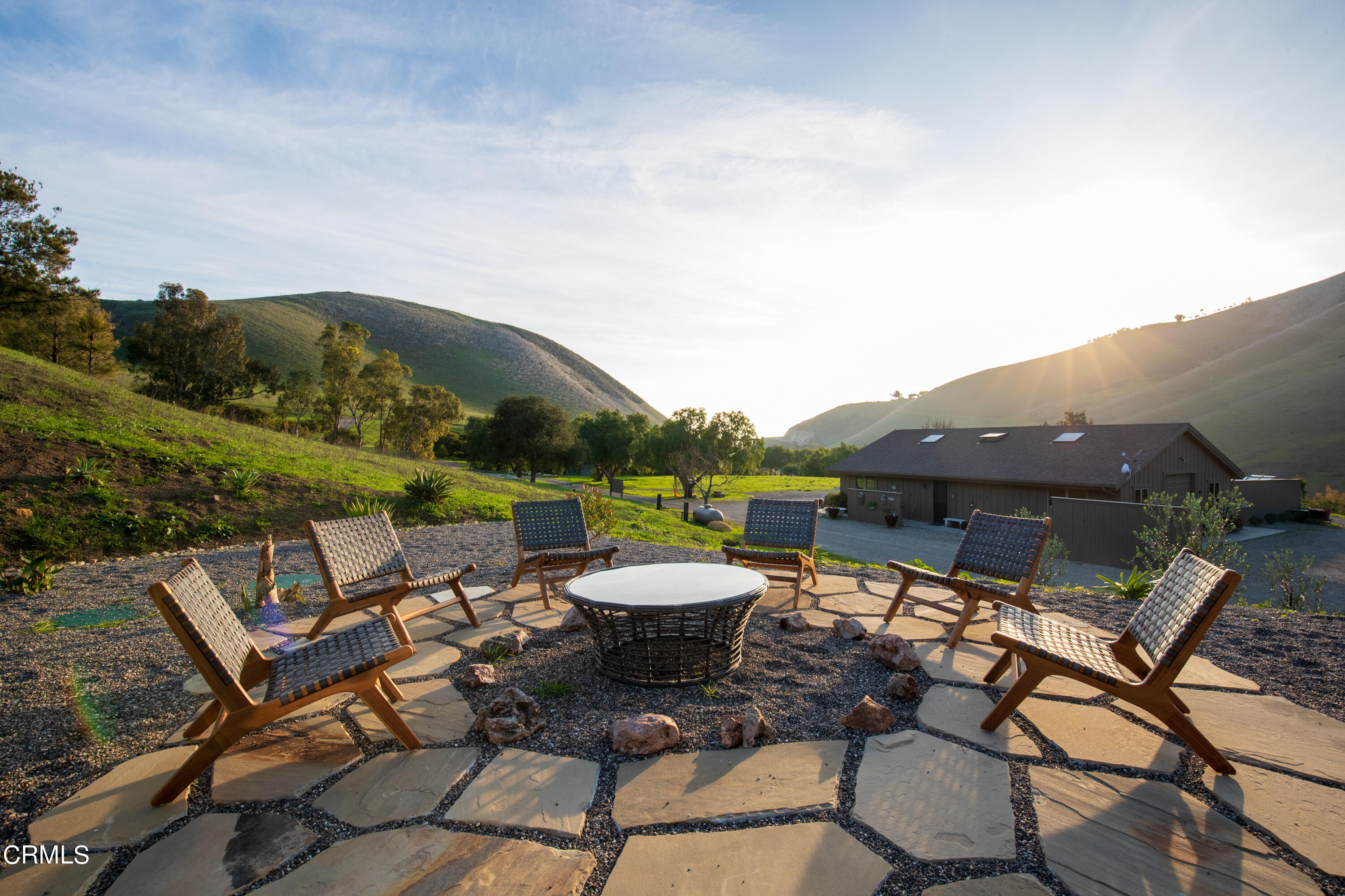 119 Hollister Ranch Road Goleta, CA 93117 - Photo 16 of 40 a view of a patio with a table and chairs