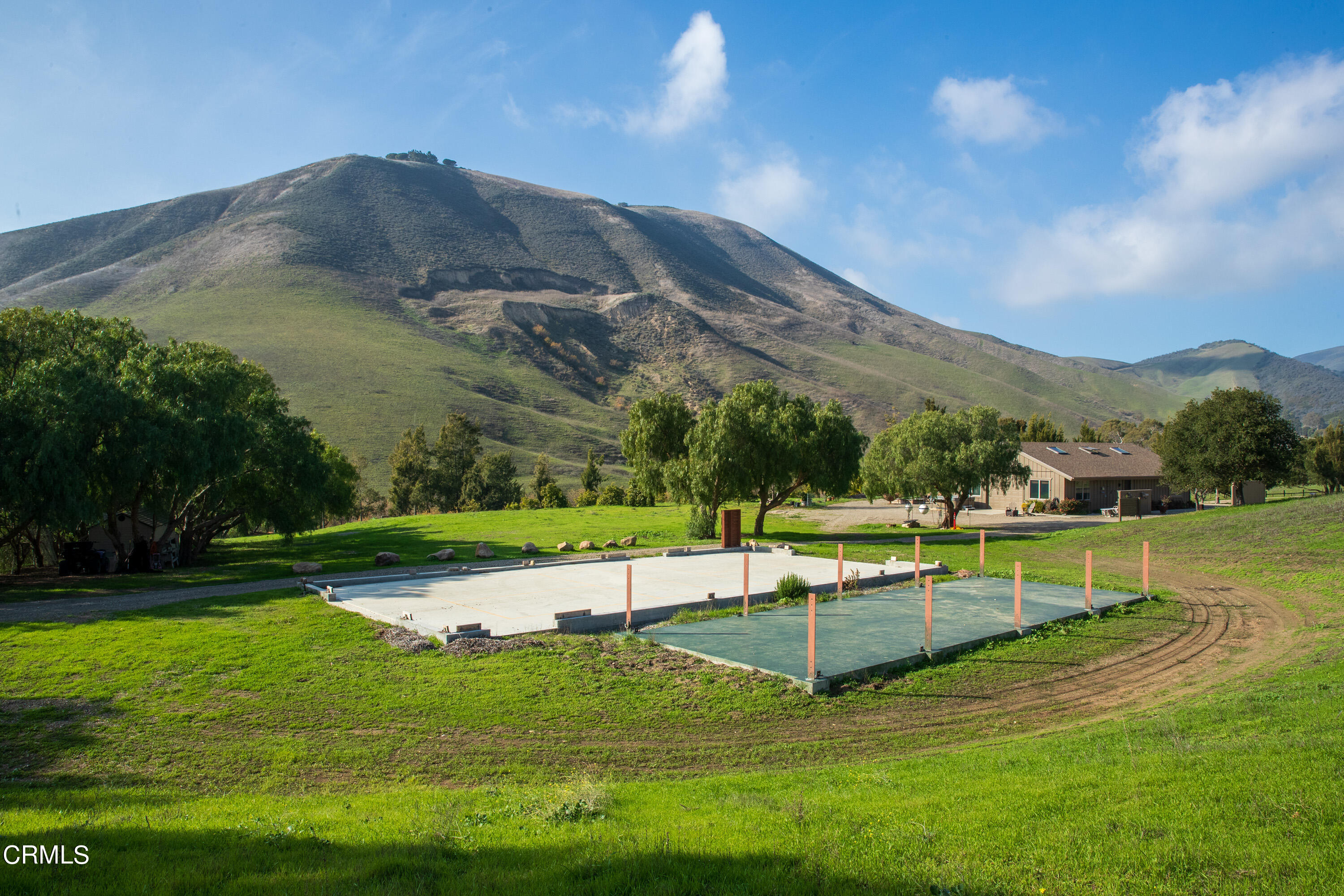 119 Hollister Ranch Road Goleta, CA 93117 - Photo 34 of 40 a view of a lake with a mountain in the background