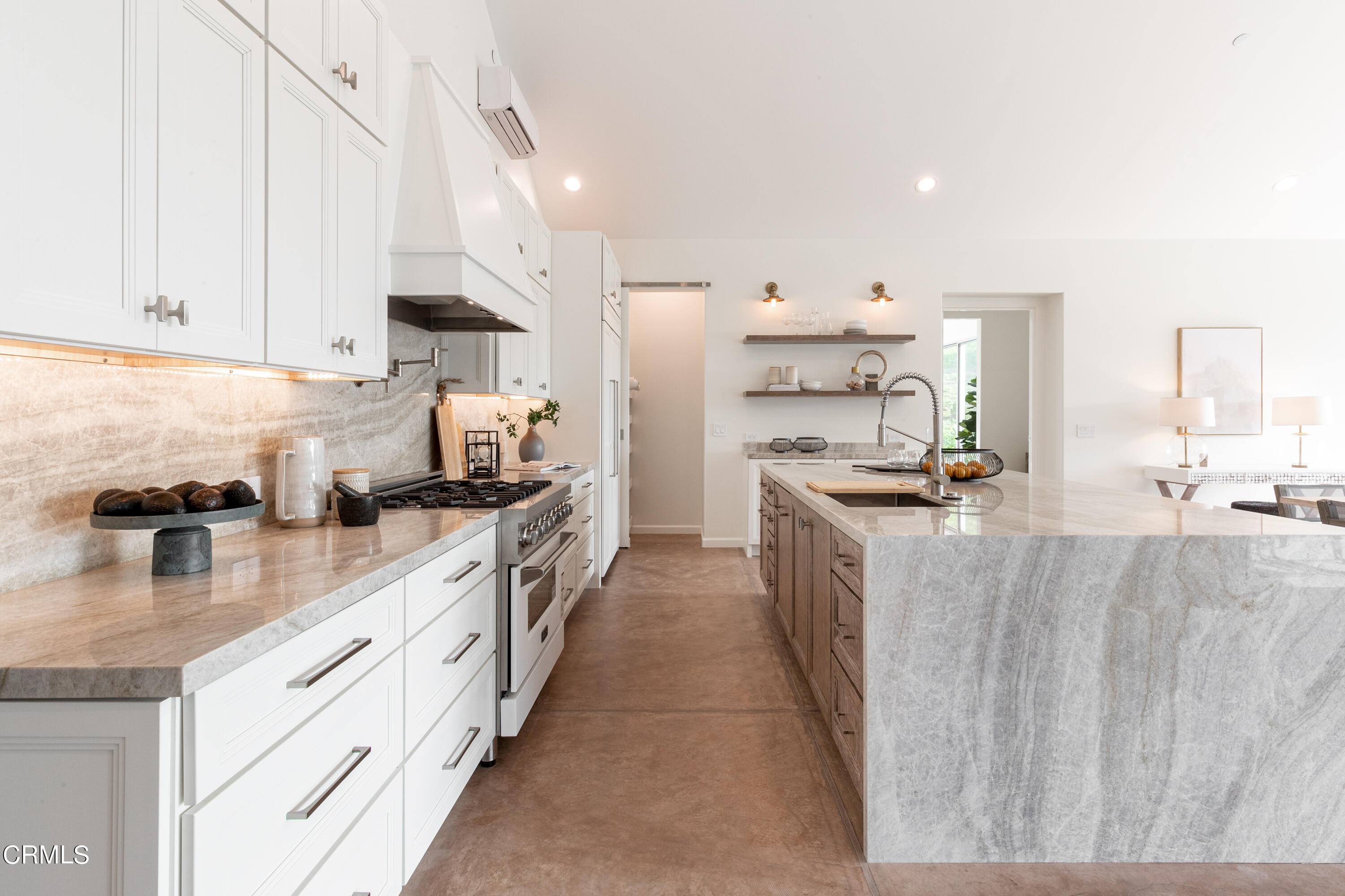 119 Hollister Ranch Road Goleta, CA 93117 - Photo 6 of 40 a large kitchen with stainless steel appliances lots of counter space and a sink