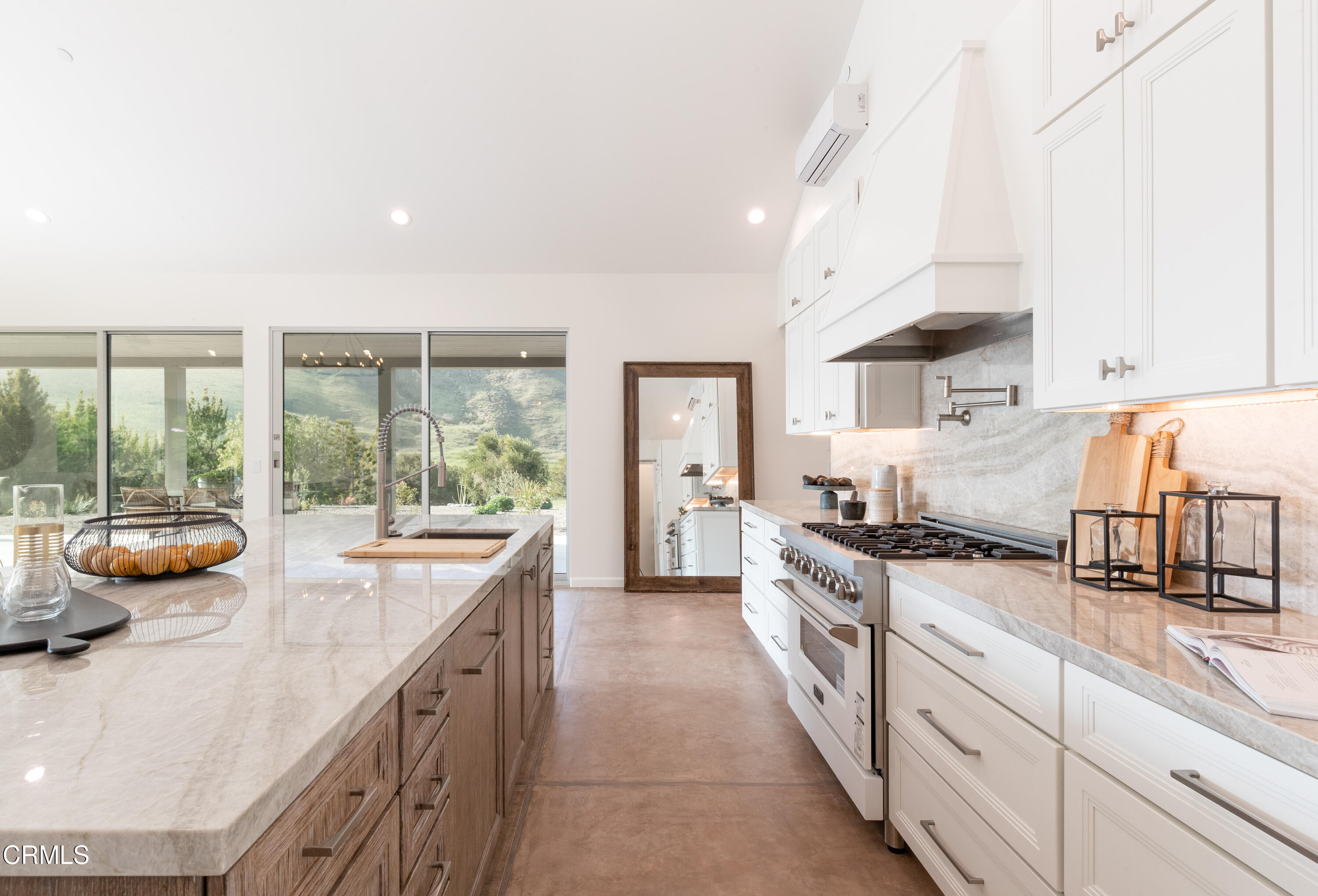 119 Hollister Ranch Road Goleta, CA 93117 - Photo 7 of 40 a large kitchen with stainless steel appliances granite countertop a lot of counter space and a window