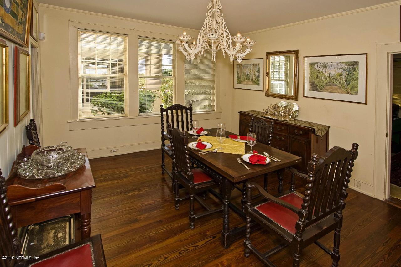 84 Water Street St. Augustine, FL 32084 - Photo 15 of 25 a living room with furniture and a chandelier