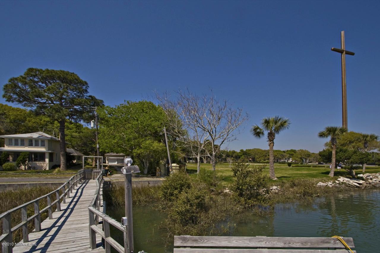 84 Water Street St. Augustine, FL 32084 - Photo 18 of 25 a view of a swimming pool with a yard