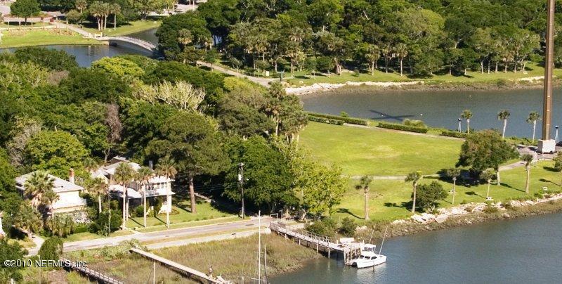 84 Water Street St. Augustine, FL 32084 - Photo 2 of 25 a view of a lake with a yard and mountain view