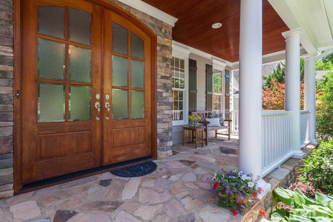 8814 Fidelis Lane Raleigh, NC 27613 - Photo 2 of 25 Welcoming front porch with beautiful stone detail.