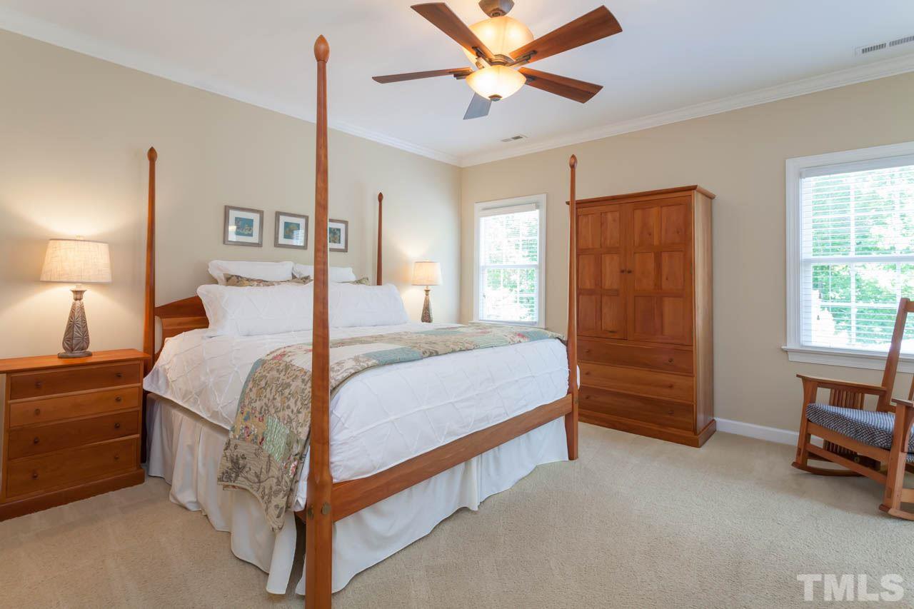 8814 Fidelis Lane Raleigh, NC 27613 - Photo 14 of 25 Retreat into this fabulous Master Suite adorned with crown molding and ceiling fan.
