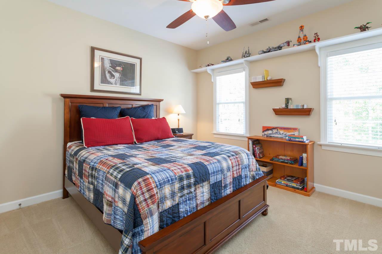 8814 Fidelis Lane Raleigh, NC 27613 - Photo 19 of 25 Another large and spacious secondary bedroom.