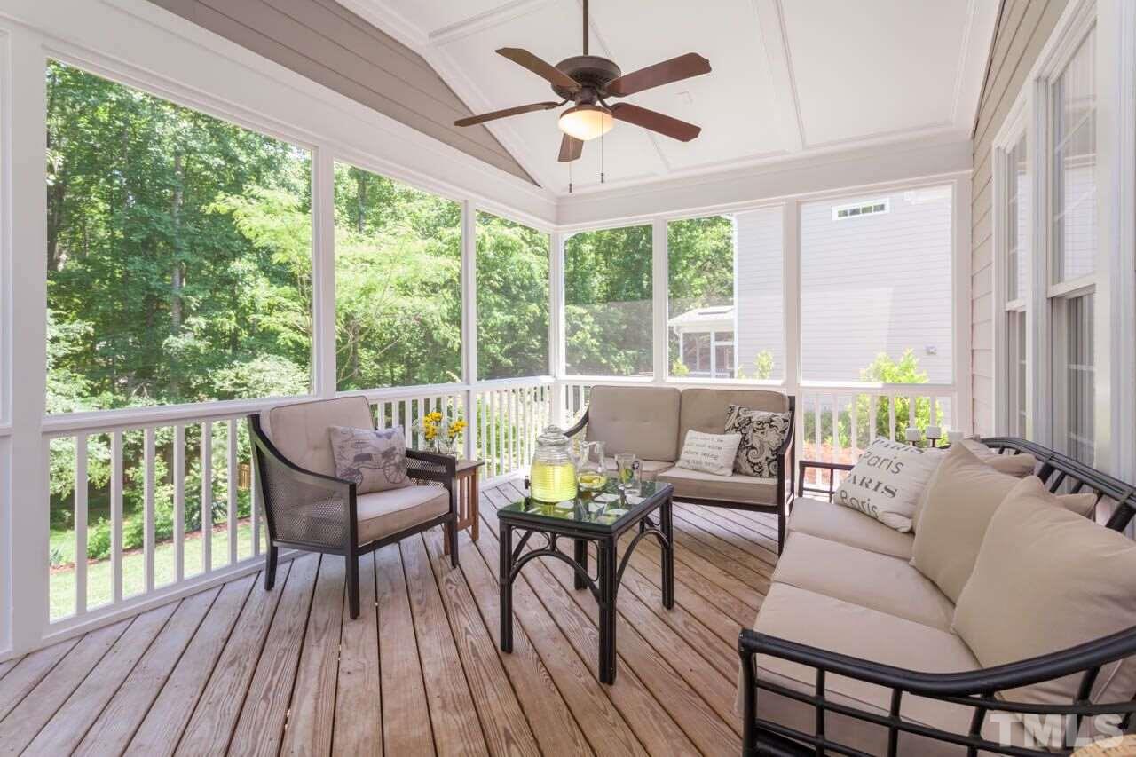 8814 Fidelis Lane Raleigh, NC 27613 - Photo 21 of 25 Enjoy the gentle NC breeze from this fabulous screened porch. You will love your private view of the back yard and giant hardwood trees.