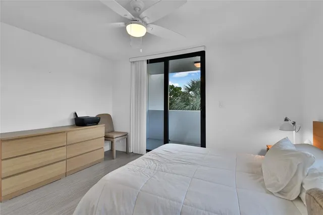 a view of a chairs and table in patio