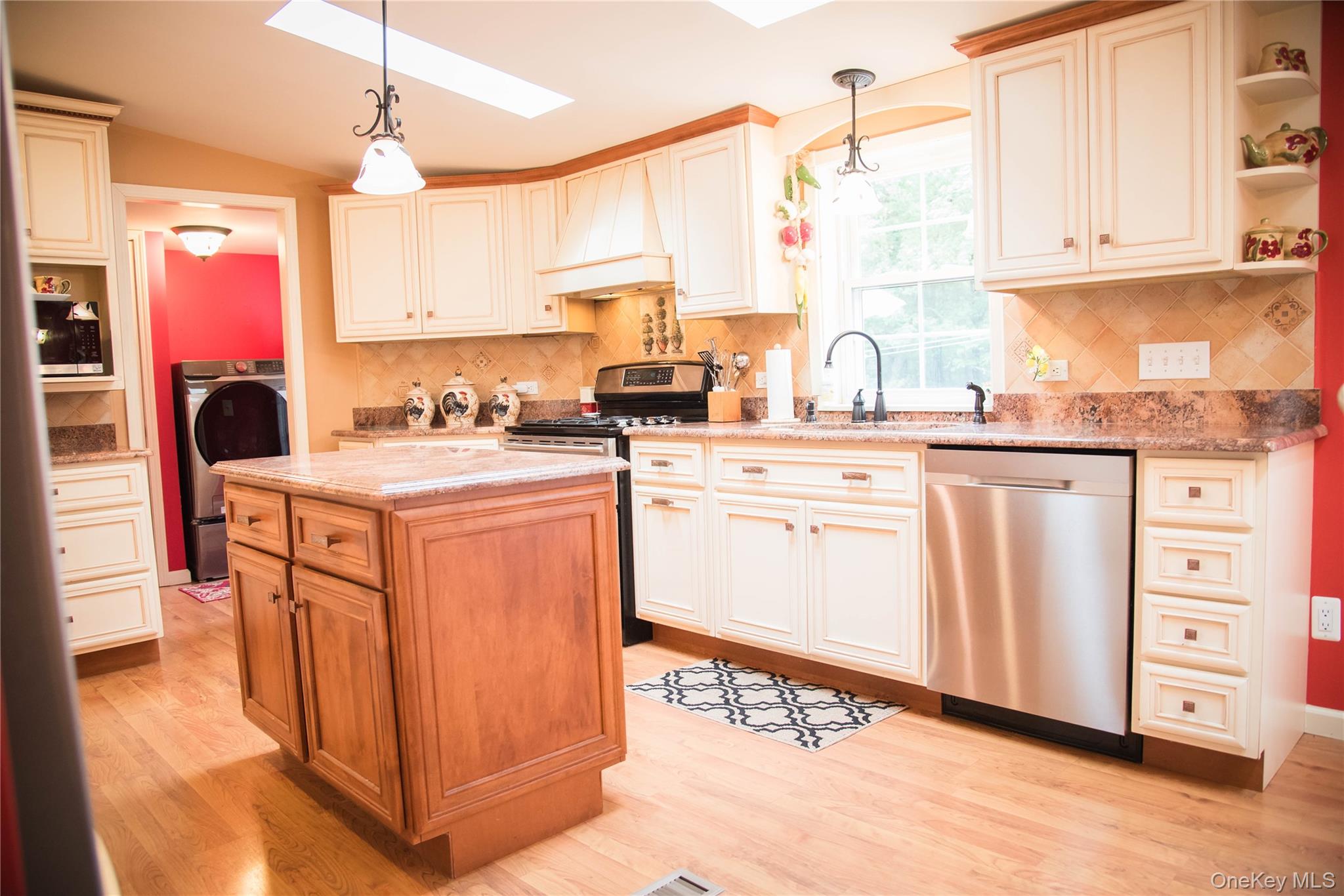 502 Myers Road Neversink, NY 12765 - Photo 12 of 38 a kitchen with stainless steel appliances granite countertop a sink a stove and cabinets