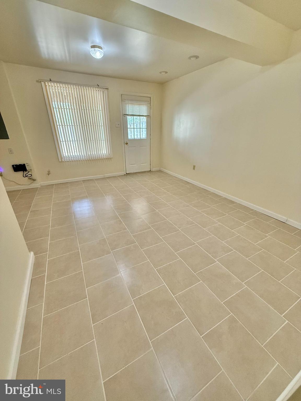 8349 Windfall Road Springfield, VA 22153 - Photo 39 of 48 a view of an empty room with a window