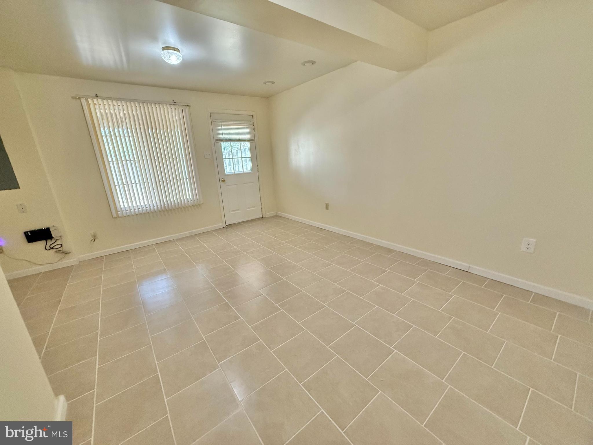 8349 Windfall Road Springfield, VA 22153 - Photo 40 of 48 a view of an empty room with a window