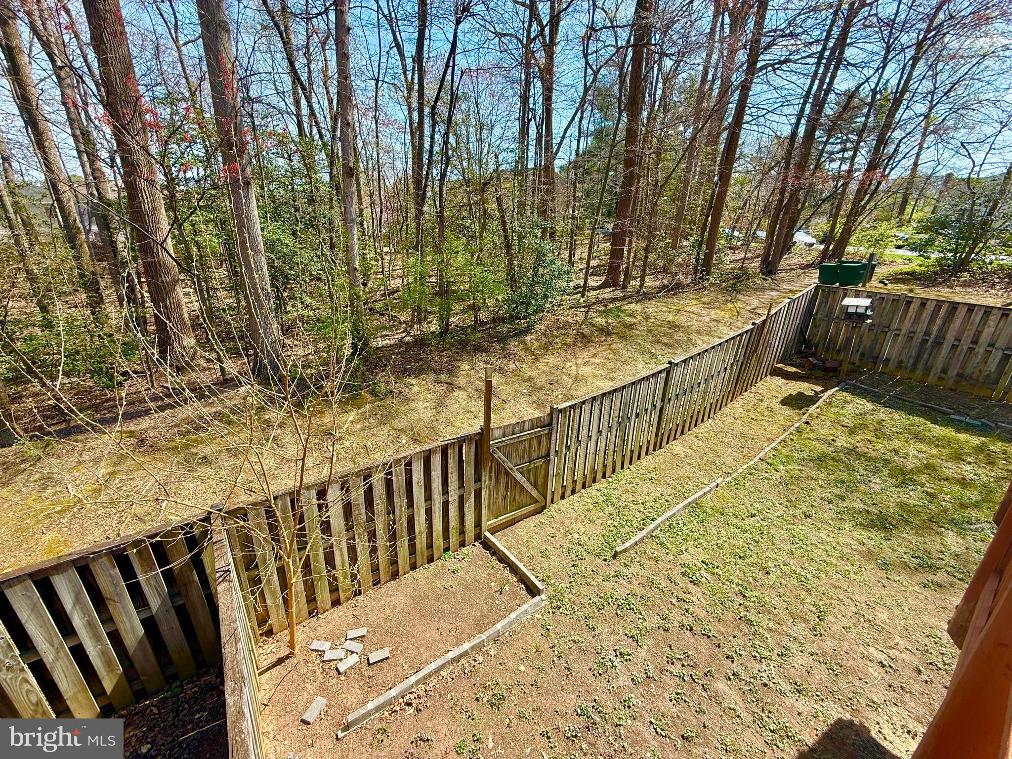 8349 Windfall Road Springfield, VA 22153 - Photo 48 of 48 a view of a balcony with wooden floor and fence