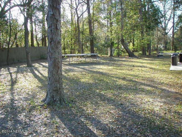 2070 Benedict Road Jacksonville, FL 32209 - Photo 14 of 38 a view of outdoor space with trees