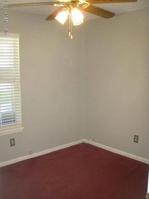 2070 Benedict Road Jacksonville, FL 32209 - Photo 27 of 38 an empty room with a window
