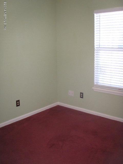 2070 Benedict Road Jacksonville, FL 32209 - Photo 29 of 38 an empty room with a window